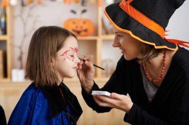 Applying Halloween make-up