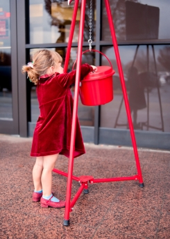 Child Making a Donation