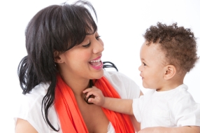 Real People: Black African American Mother Talking with Toddler Boy