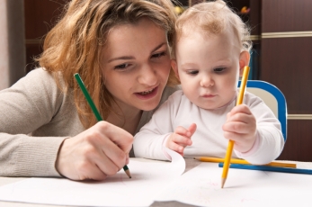 Mother and daughter drawing