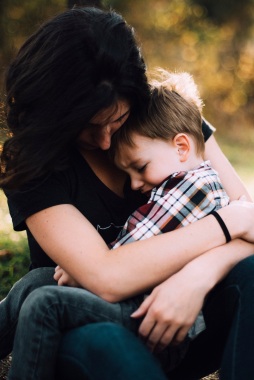 Mom hugging child